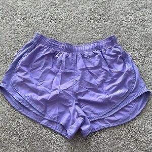 Purple Nike tempo running shorts